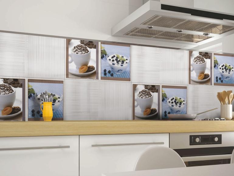 Modern I kitchen design with decorative food-themed tiles, sleek cabinetry, wooden countertop, and stainless steel appliances.